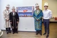 Prof Sunny WONG (first from left), Prof Wai-Yee CHAN (second from left), Prof Kenneth YOUNG (second from right) and Bekbolot (first from right) tried on the traditional Kyrgyz costume.